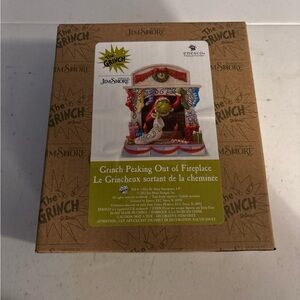 Jim Shore The Grinch Peaking out of Fireplace figurine